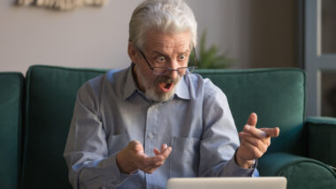 Shocked stressed senior mature man