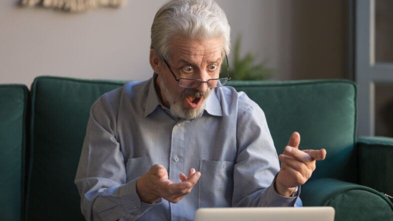 Shocked stressed senior mature man