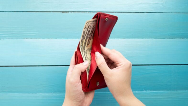 The person recalculates money.